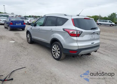 2017 Ford Escape Titanium из США, поврежденный, VIN 1FMCU0J9XHUA75058